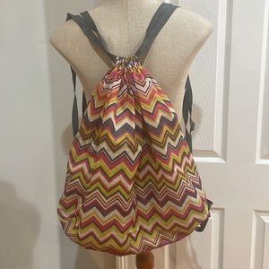 Iota backpack lightweight large chevron red green white gray